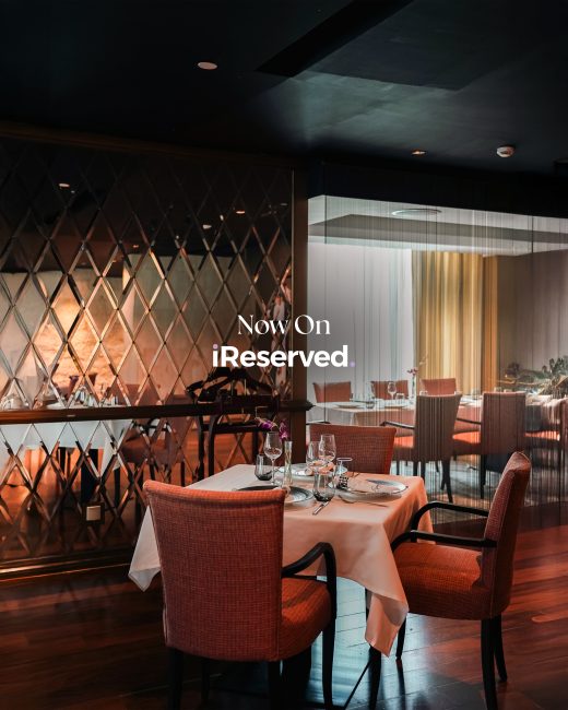 Signature by Sanjeev Kapoor fine dining restaurant interior with elegant table setup